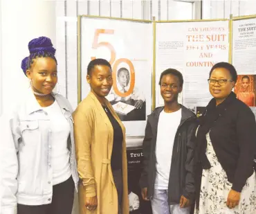  ?? Photo: Athenkosi Sawutana ?? Can Themba's family at Themba’s work exhibition in Eden Grove at The National Arts Festival. From left, Zuzile Ganda, Yvonne Themba, Andile Can Themba and Morongwa Themba.