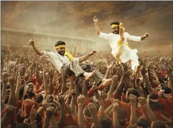  ?? NETFLIX VIA THE ASSOCIATED PRESS ?? This image released by Netflix shows Ram Charan and N.T. Rama Rao Jr. in a scene from “RRR.”