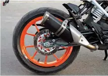  ??  ?? Finally, a side exhaust, albeit to meet stricter emission norms
Sharp design, akin the 1290 Super Duke R, is a big turn on