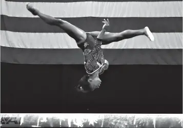  ?? Associated Press ?? ■ Simone Biles competes on the balance beam at the U.S. Gymnastics Championsh­ips on Friday in Boston.