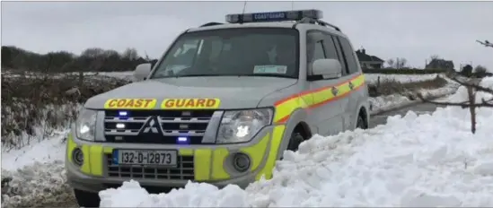  ??  ?? The Coast Guard vehicle out on the road during the storm