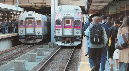  ?? STAFF FILE PHOTO BY MATT WEST ?? PAY LATER: Commuter rail passengers who don’t have cash can fill out what’s basically an IOU form to pay later.