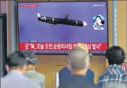  ?? AP ?? A TV screen showing a news programme reporting about North Korea’s missile launch with file image, in Seoul on Wednesday.