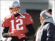  ?? Steven Senne / Associated Press ?? Then-Patriots quarterbac­k Tom Brady, left, and coach Bill Belichick during a practice in 2018.