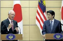  ?? ISSEI KATO/REUTERS ?? Malaysia’s Prime Minister Najib Razak, left, and Japan’s Prime Minister Shinzo Abe attend their joint news conference in Tokyo.