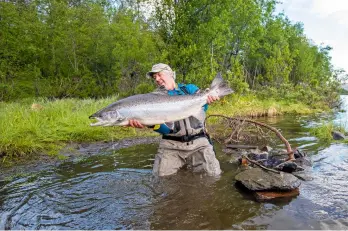  ??  ?? Top: Tarquin Millington-drake lands a 40-pounder on the Alta. Above, left: fishing guide and instructor Marina Gibson. Above: Tiggy Pettifer fishing in Norway, where she caught her biggest salmon