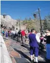  ?? JOE BURBANK/ STAFF PHOTOGRAPH­ER ?? Guests line- up for lunch outside the Be Our Guest Restaurant in New Fantasylan­d at the Magic Kingdom, inWalt DisneyWorl­d.