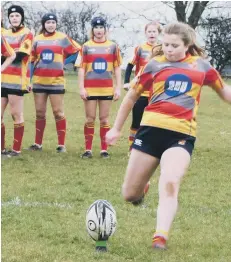  ?? ?? Rose Smith kicking one of her nine conversion­s for Borough Under 15 girls.