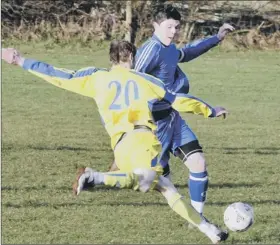  ??  ?? CUP SHOCK ... Seamer (yellow shirts) get stuck in during their 6-2 win over first division Staxton, above 120364b and below 120364e Pictures: Neil Silk