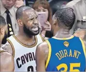  ?? Jason Miller Getty Images ?? LeBRON JAMES and Kevin Durant had a heated chat in the third quarter, and each got a technical.