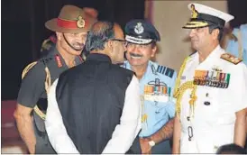  ?? ARVIND YADAV/HT ?? Defence minister Arun Jaitley interacts with (from left) army chief Gen Dalbir Singh, Air Chief Marshal Arup Raha and navy chief Admiral RK Dhowan at the swearing-in ceremony on Sunday.