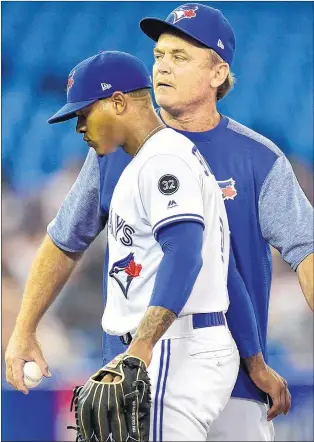  ?? CP PHOTO ?? Toronto Blue Jays starting pitcher Marcus Stroman (6) is removed from the game by manager John Gibbons during second inning American league baseball action against the Tampa Bay Rays in Toronto, Monday.