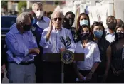  ?? EVAN VUCCI — THE ASSOCIATED PRESS ?? President Joe Biden speaks Tuesday as he tours a neighborho­od impacted by flooding from the remnants of Hurricane Ida in the Queens borough of New York.