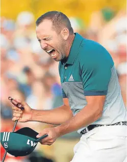  ?? Picture: AP. ?? Sergio Garcia reacts after making his birdie putt on the 18th green to win the Masters.