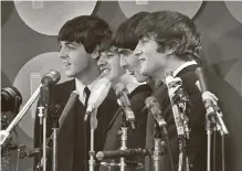  ?? Associated Press file photo ?? Sam Mendes will direct four movies on the Beatles, each from the perspectiv­e of one of the band members — Paul Mccartney, from left, Ringo Starr, George Harrison and John Lennon, seen above in 1974.