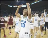  ?? Associated Press ?? UCLA guard Charisma Osborne (20) reacts towards the stands after defeating Oklahoma 82-73 in a second-round NCAA Tournament game, Monday, in Los Angeles. Osborne scored a career-high 36.