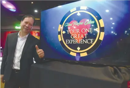 ?? SUNSTAR FOTO / RUEL ROSELLO ?? YOUR ONE GREAT EXPERIENCE. Casino Filipino Cebu manager Ricardo Uy unveils their new tagline.