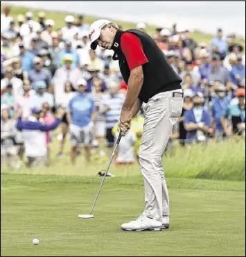  ?? DAVID J. PHILLIP / ASSOCIATED PRESS ?? Steve Stricker putts on the ninth hole as he finishes the U.S. Open with a 5-under total, putting him in a tie for 16th place at Erin Hills.