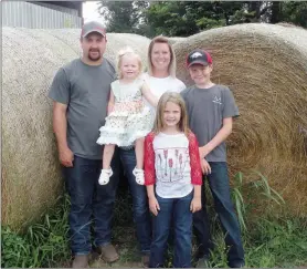  ?? CAROL ROLF/CONTRIBUTI­NG PHOTOGRAPH­ER ?? The Dustin Walker family of Ola is the 2019 Yell County Farm Family of the Year. The family includes Dustin and his wife, Melanie, and their children: Brylee, 2, Abagail, 7, and Tyler, 11. Dustin bales hay for use on the family farm, and he does custom hay-baling.