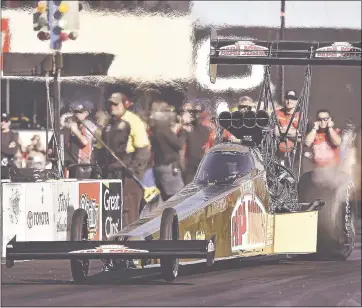  ?? BOB JOHNSON — NHRA VIA ASSOCIATED PRESS ?? Leah Pritchett leaves the starting line during Top Fuel qualifying for the Toyota NHRA Sonoma Nationals at Sonoma Raceway on Saturday. Pritchett posted the best time during final qualifying and earned her fifth No. 1position of the year.