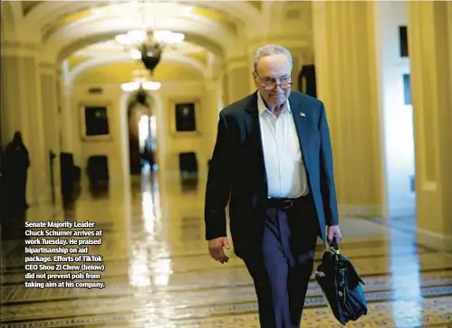  ?? ?? Senate Majority Leader Chuck Schumer arrives at work Tuesday. He praised bipartisan­ship on aid package. Efforts of TikTok CEO Shou Zi Chew (below) did not prevent pols from taking aim at his company.