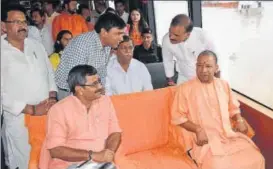  ?? HTPHOTO ?? CM Yogi inaugurate­d a cruise called Alaknanda on the Ganga at Khidkiya Ghat in Varanasi on Sunday. In picture, he is seen with UP minister of state Neelkanth Tiwari at the launch of the cruise.