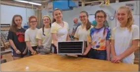  ?? FRANCINE D. GRINNELL — MEDIANEWS GROUP ?? Trinity Nolan, Erin St. Denis, Natalie Tappy, Carsyn Bonesteel, Elsa Newman, Grace Overholt, and Emma Winslow worked together to design and create a 5 chambered bat house for hybernatin­g mother bats and their babies.