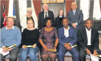  ??  ?? Celebratio­n Provost Jean Jones, Deputy Lord Lieutenant Sheriff Robert Dickson and Airdrie Academy head teacher Martin Anderson with the successful applicants