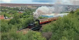  ?? ?? Resident Andrew Barclay 0-4-0Ts Nos. 1219 and 1385 double-head the climb to Furnace Sidings on September 10. KENNY FELSTEAD