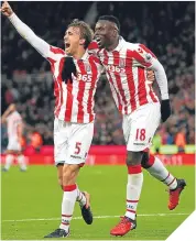  ??  ?? ■
Stoke’s Marc Muniesa celebrates scoring his side’s second goal.