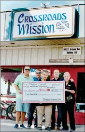  ?? LOANED PHOTO ?? THE PROCEEDS of the first Drew Pilkington Memorial Golf Tournament benefited Crossroads Mission, which received a $5,000 check for its substance abuse treatment program.