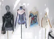  ?? ?? LEFT
Jackets for training and a skating dress, all designed by Zhang Yifan, are displayed at her studio.