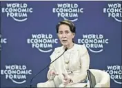  ??  ?? MYANMAR leader Aung San Suu Kyi, speaking at a World Economic Forum gathering Thursday, defended the imprisonme­nt of the two journalist­s.