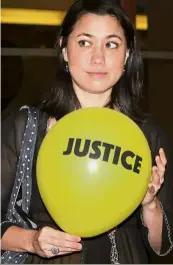 ??  ?? Free at last:A file picture of Bilqis with one of the balloons that saw her being charged under the Minor Offences Act.