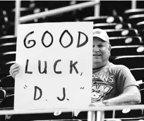  ?? ROBERT MAYER, USA TODAY SPORTS ?? A fan shows his support for new Marlins manager Dan Jennings on Monday.