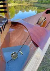  ?? ?? The rounded transom, mahogany transom brace, and custom designed aluminum block.