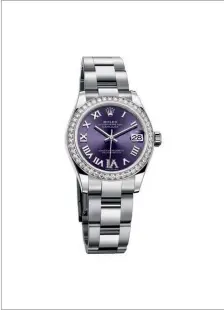  ??  ?? Oyster Perpetual Datejust 31 with aubergine dial