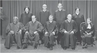  ?? H. DARR BEISER, USA TODAY ?? 2010 portrait, from left: Clarence Thomas, Sonia Sotomayor, Antonin Scalia, Stephen Breyer, Chief Justice John Roberts, Samuel Alito, Anthony Kennedy, Elena Kagan, Ruth Bader Ginsburg