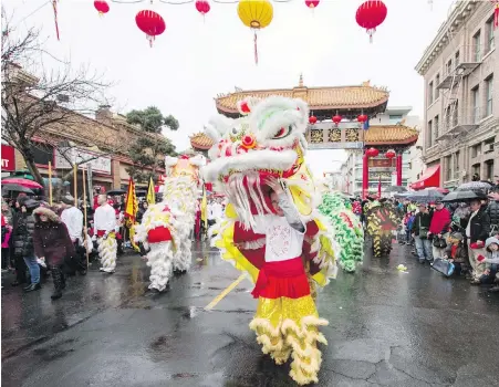  ??  ?? A lion dance and parade are planned for Chinatown on Sunday. Lunar new year festivitie­s begin at noon.