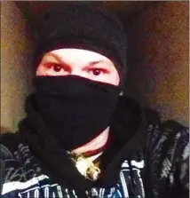  ?? CONTRIBUTE­D/Facebook ?? A photo from Aaron Hillstad’s Facebook page shows him with a face scarf similar to the one worn by a video game character whose super powers he apparently tried to summon.