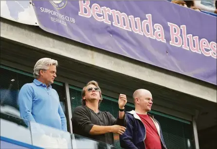  ?? Frank Augstein / Associated Press ?? Todd Boehly, center, stands during the English Premier League soccer match between Chelsea and Wolverhamp­ton Wanderers at Stamford Bridge stadium in London on Saturday.