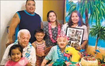  ?? Shyvonne Noboa ?? TOBIAS NOBOA, second from left, was a robust 82-year-old who was the patriarch of a four-generation household in Queens, N.Y. In April 2020, COVID-19 entered the home, and a few weeks later, Tobias died.