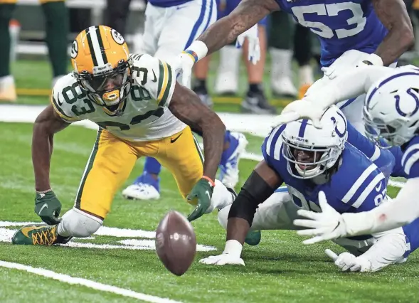  ?? ASSOCIATED PRESS ?? Packers wide receiver Marquez Valdes-Scantling fumbles a reception that led to a winning field goal for the Indianapol­is Colts on Sunday.