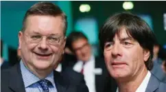  ?? FOTO: NTB SCANPIX ?? Tysklands fotballpre­sident Reinhard Grindel, her sammen med landslagss­jef Joachim Löw, kan juble over at det blir EM på hjemmebane i 2024.