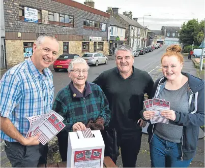  ?? Picture: Steven Brown. ?? JP Easton and David Hewitt of Fife Council, Markinch resident Marion Law and modern apprentice Amy Nicol with ballot boxes for ideas on how to spend £20,000 in the town.