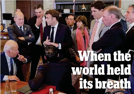  ?? ?? Tense: Clockwise from centre, Mr Sunak, Joe Biden, Olaf Scholz, Pedro Sanchez, Emmanuel Macron, foreign ministers Jose Manuel Albares (Spain) and Catherine Colonna (France), Justin Trudeau, US secretary of state Antony Blinken and adviser Jake Sullivan