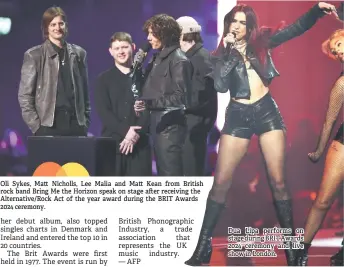  ?? ?? Oli Sykes, Matt Nicholls, Lee Malia and Matt Kean from British rock band Bring Me the Horizon speak on stage after receiving the Alternativ­e/Rock Act of the year award during the BRIT Awards 2024 ceremony.
Dua Lipa performs on stage during BRIT Awards 2024 ceremony and live show in London.