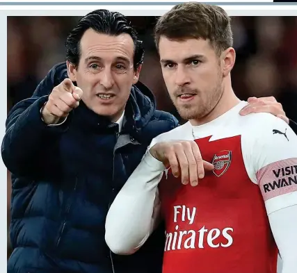  ?? REX SHUTTERSTO­CK ?? Big contributi­on: coach Unai Emery has continued to pick Aaron Ramsey