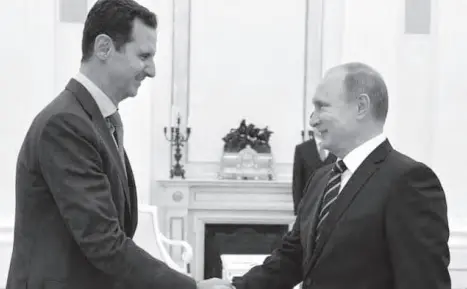  ??  ?? Syrian president Bashar Al-Assad and his foreign supporter Russian President Vladimir Putin