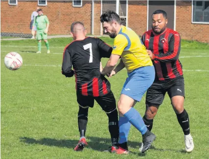  ?? Pictures: Jon Kent ?? Action, above and below, from Seymour United’s 1-0 victory against Shaftesbur­y Crusade (red and black stripes) at Coronation Park